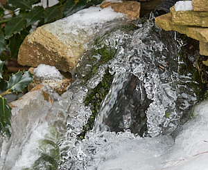Ice build up from splaashes around a garden waterfall